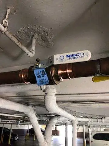 Copper pipe repair and valve work for Backflow Testing in German